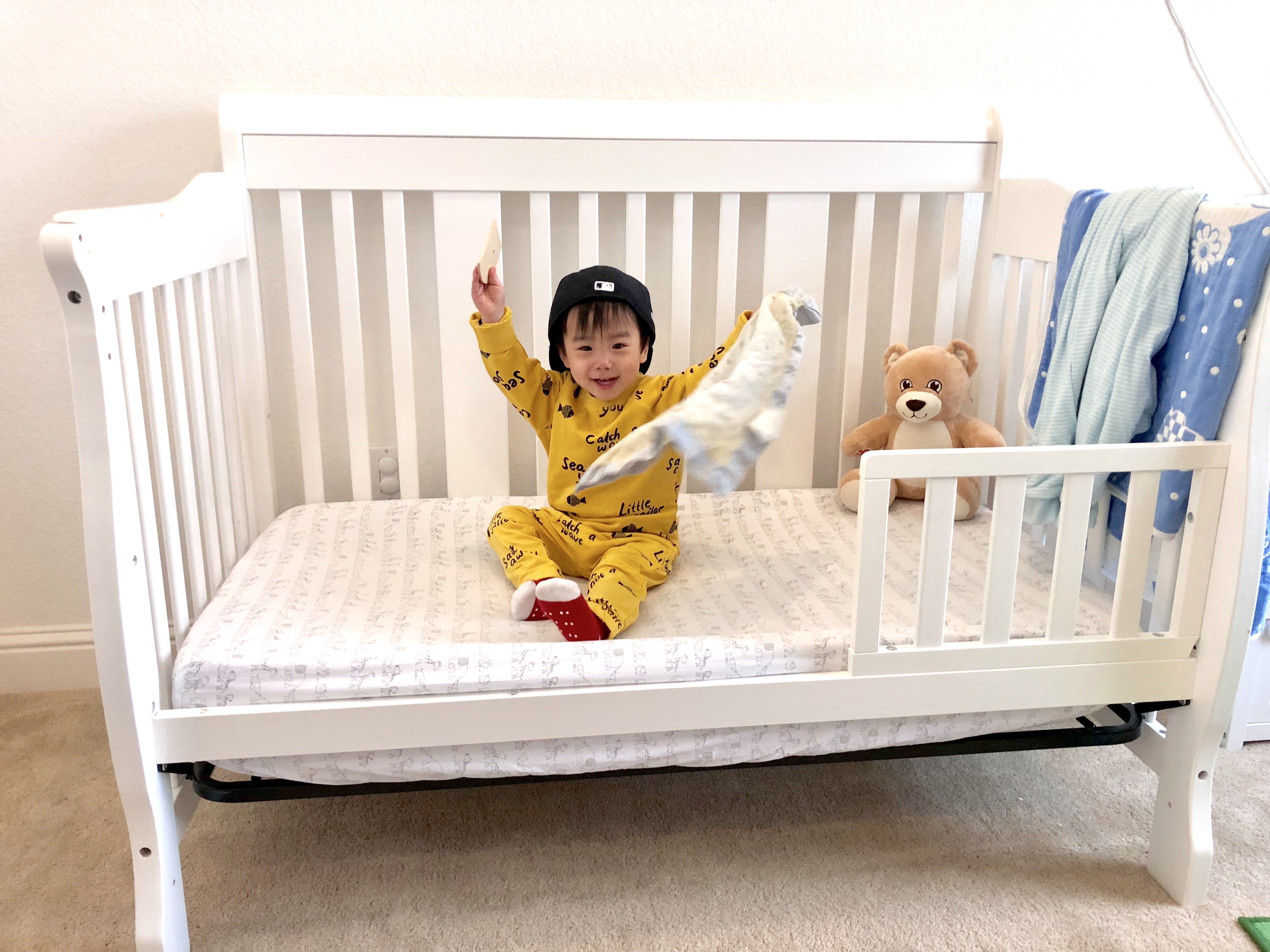 how to change a cot bed into a bed